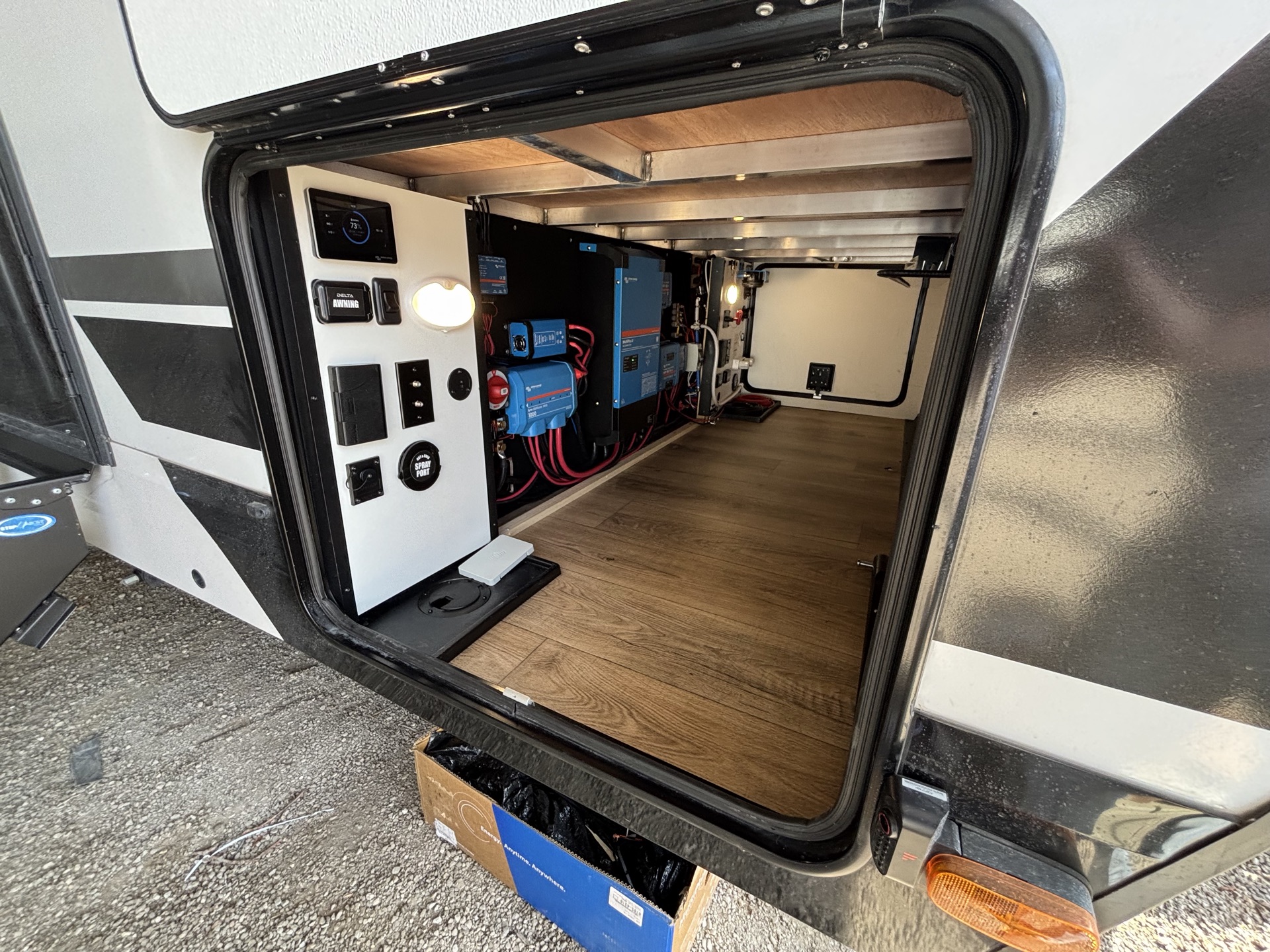 RV pass through bay with electrical system